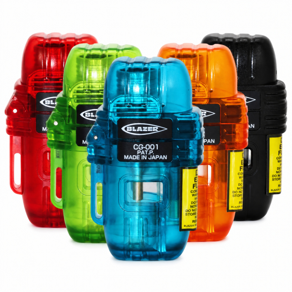 Five Blazer CG-001 Cigar Torch Lighter devices in red, orange, green, blue, and black, arranged in a row on a white background. The front blue unit is centered and labeled 'BLAZER' and 'CG-001 PAT P MADE IN JAPAN'.
