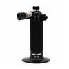 A black handheld Blazer Hot Shot MT-3000 Butane Refillable Micro Torch with a ribbed handle, a flat circular base, and a side nozzle, shown on a plain white background. The base is printed with the text 'HOT SHOT MT-3000'.