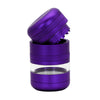 A metallic purple herb grinder with a clear glass window, shown with its lid removed and tilted, on a plain white background.