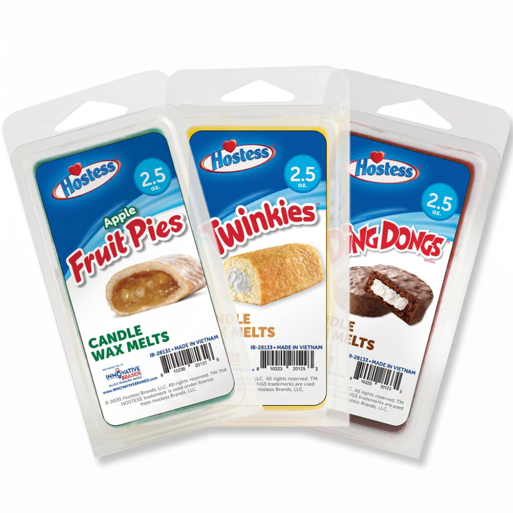 Three packages of Hostess-themed candle wax melts on a white background