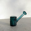 Jane West Twenties Collection Glass Hand Pipe on a gray surface with a white background
