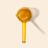 A translucent NWTN Home Deco Hand Pipe, shown against a solid cream background with a soft shadow.