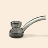 A NWTN Home dark gray smoked glass water pipe with a curved neck and a small decorative knob on the bowl, set against a solid light beige background.