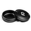 Black storage puck with a logo on a white background